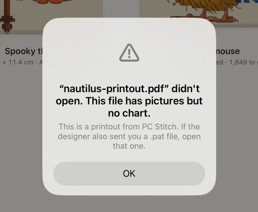 A card on the shelf saying a file didn't open and why, with a Send it to us button.