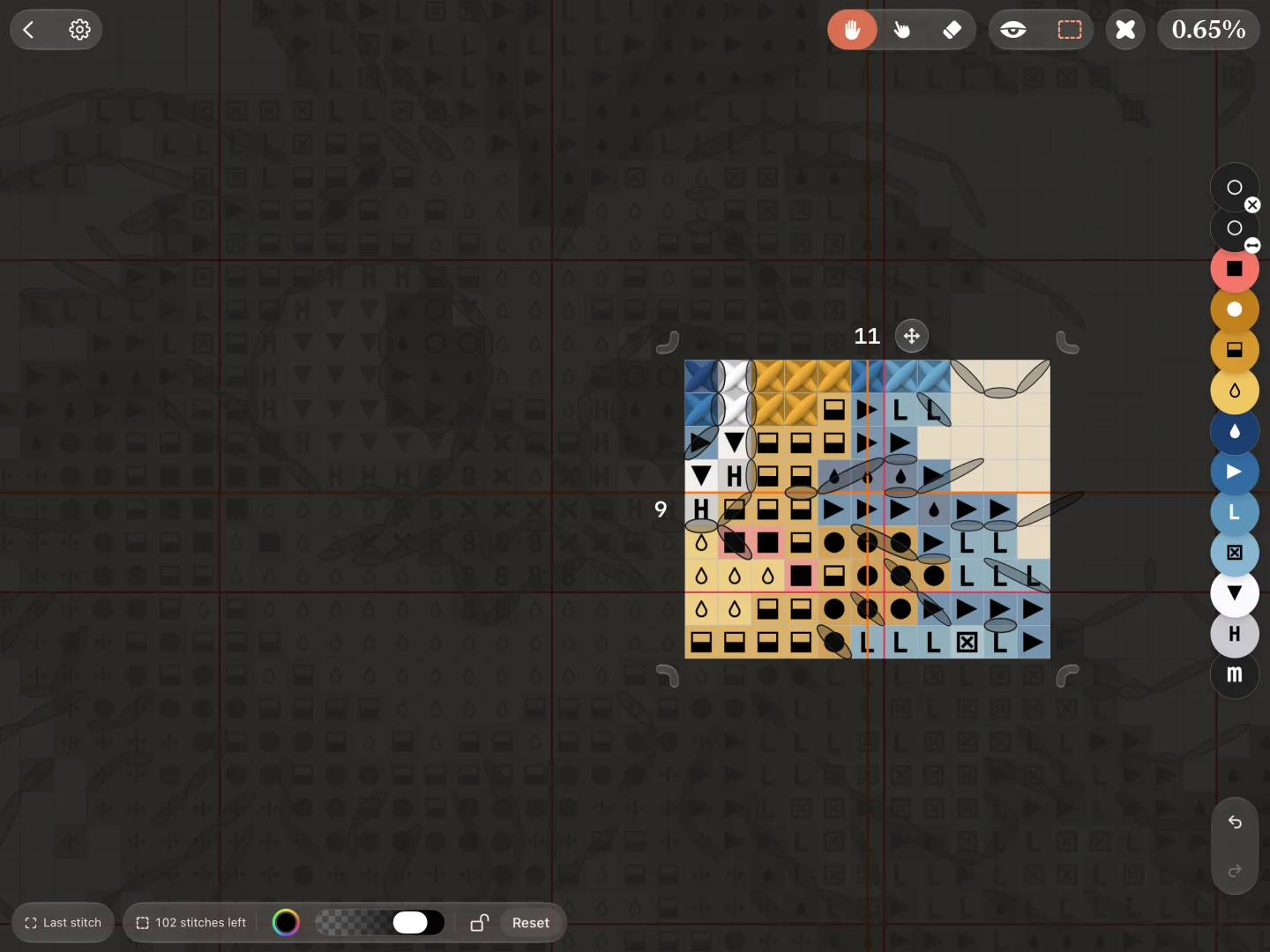 The work area on the chart: a rectangle with handles, everything outside it darkened, and a capsule at the foot with stitches left, outside colour, darkness, lock and Reset.